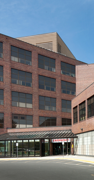 Brick and Glazed Facade with Glass Canopied Emergency Entrance